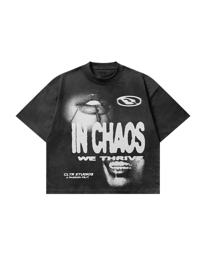 IN CHAOS WE THRIVE